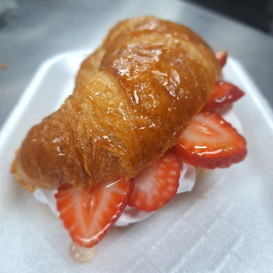 Croissant with butter filled with  Strawberries and Cream